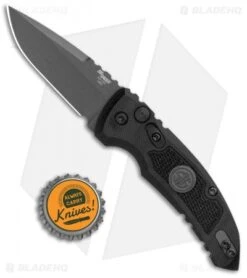Hogue Knives A01 Microswitch Auto Knife Sig Medallion Drop Point (2.6" Black) -Knife Sale Shop Hogue A01 Microswitch Wharncliffe Black Sig Medallion Black 16112 BHQ 100451 jr bottlecap