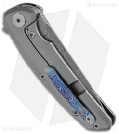 Reate Knives New Epoch Frame Lock Knife Titanium W/Mokuti Inlay (3.5" Damasteel) -Knife Sale Shop Reate New Apoch Ti Mokuti Inlay Damasteel BHQ 51443 jr side